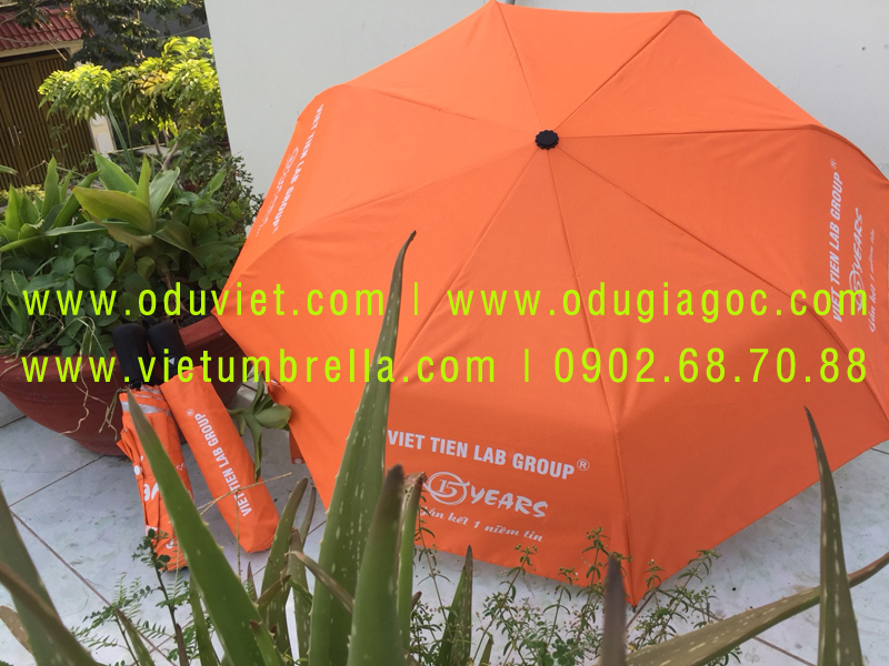 xưởng sản xuất ô dù cầm tay in logo quảng cáo